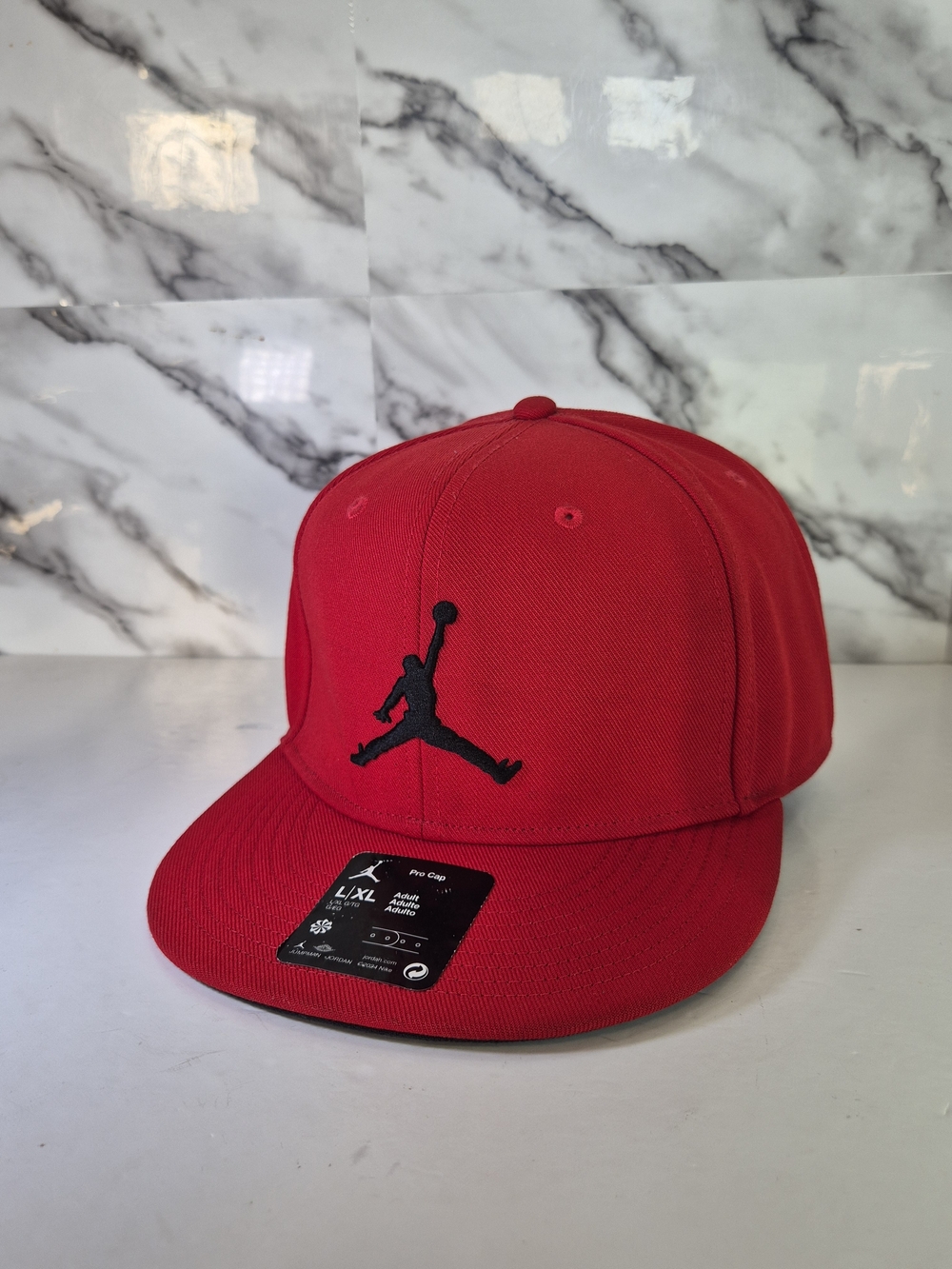 Jordan Red Snapback Hat with Black Jumpman Logo. Adjustable